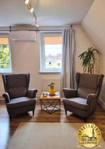 Posezení v ubytování Apartament w Rynku + 24 fotografií