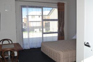Postel nebo postele na pokoji v ubytování 319 Addington Motel
