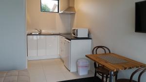 Kuchyň nebo kuchyňský kout v ubytování 319 Addington Motel
