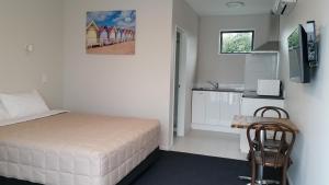 Postel nebo postele na pokoji v ubytování 319 Addington Motel
