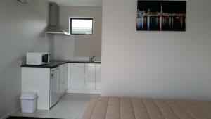 Kuchyň nebo kuchyňský kout v ubytování 319 Addington Motel