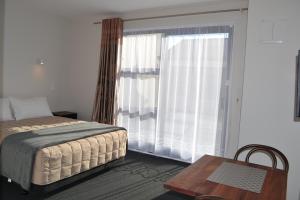 Postel nebo postele na pokoji v ubytování 319 Addington Motel