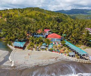 an aerial view of a resort on the beach at Appleton Little Paradise Beach Resort & Restaurant REAL QUEZON in Real