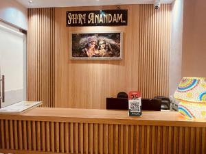 a reception desk with a sign that reads star grandah at SHRI ANANDAM Inn in Isauli
