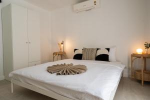 Ένα ή περισσότερα κρεβάτια σε δωμάτιο στο Manao Pool Villa 40A - 5Mins Walk To Beach +20 φωτογραφίες
