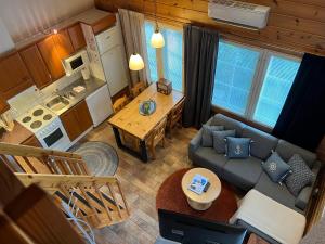 an overhead view of a living room and a kitchen at Vuokatin Aateli Apartments in Vuokatti