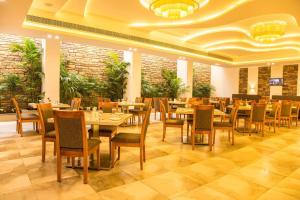 מסעדה או מקום אחר לאכול בו ב-Hotel Vivera Grande