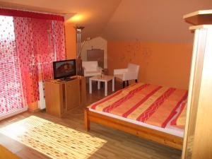 En eller flere senge i et værelse på Penzion u Mikulinců