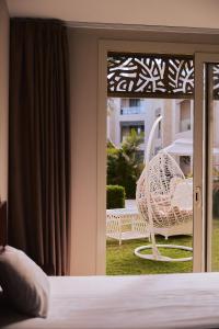 Postel nebo postele na pokoji v ubytování Mangroovy apartament El gouna