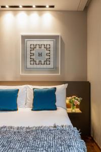 Postel nebo postele na pokoji v ubytování Posta Design Hotel