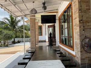 Balkón nebo terasa v ubytování ชิลชิลขนอมพูลวิลลา