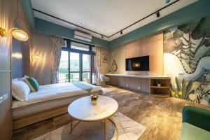 Μια τηλεόραση ή/και κέντρο ψυχαγωγίας στο 秀森山電梯民宿Show B&B