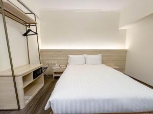 Postel nebo postele na pokoji v ubytování Hu House