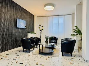 Televízia a/alebo spoločenská miestnosť v ubytovaní A-Austerlitz Hotel