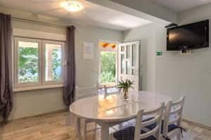 Μια τηλεόραση ή/και κέντρο ψυχαγωγίας στο Apartment 3609-5 for 3 Pers in Karbuni