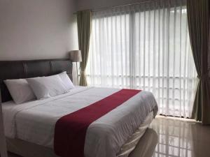 Postel nebo postele na pokoji v ubytování Resort88 Villa