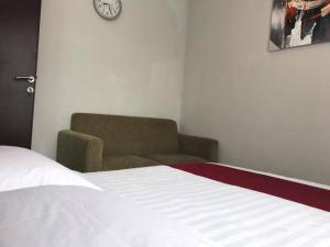 Postel nebo postele na pokoji v ubytování Resort88 Villa + 2 fotografie