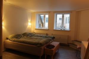 Postel nebo postele na pokoji v ubytování Visit wonderful Odense center - 3 bedroom appartment