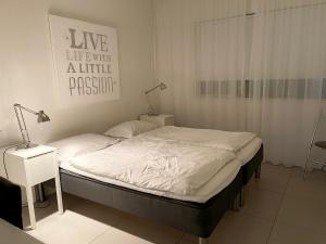 Voodi või voodid majutusasutuse Halllandsnes Apartments toas