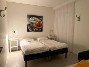 Voodi või voodid majutusasutuse Halllandsnes Apartments toas