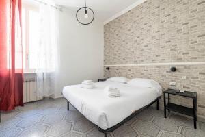 Postel nebo postele na pokoji v ubytování VG PANTHEON 5 STELLE Parlamento Room