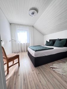 Postel nebo postele na pokoji v ubytování Ferienhaus an der Stadtmauer