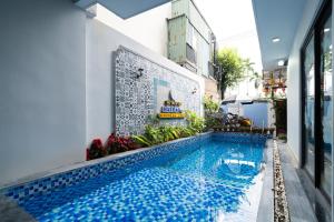Bazén v ubytování HAI DAO HOI AN VILLA nebo v jeho okolí