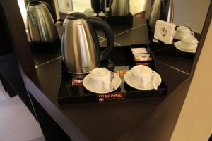 Kaffe- og tefaciliteter på 100 Sunset Kuta Hotel & Ballroom