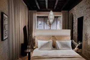 Postel nebo postele na pokoji v ubytování Nobis Hotel Palma, a Member of Design Hotels