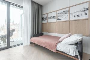 Posteľ alebo postele v izbe v ubytovaní Apartamenty DEO PLAZA by Rent like home