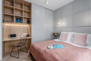 Posteľ alebo postele v izbe v ubytovaní Apartamenty DEO PLAZA by Rent like home + 37 fotografií