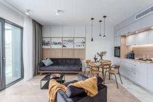 Kuchyňa alebo kuchynka v ubytovaní Apartamenty DEO PLAZA by Rent like home