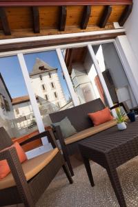 Posezení v ubytování Hôtel Lastiry
