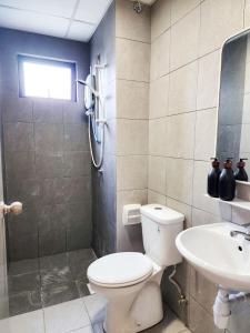 a bathroom with a toilet and a sink at Flora Residency KL -- Botanical Vibes #3BR2B #1-7 pax by Cowidea in Kuala Lumpur +12 photos