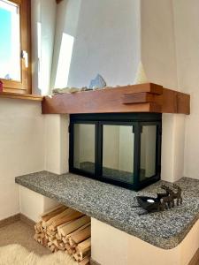 Imagem da galeria de Cosy studio apartment in Splügen em Splügen