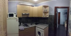 Кухня или мини-кухня в Apartment Katerynivska 8

