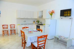 Dapur atau dapur kecil di Il Trullo di Pina a 2 minuti da spiaggia sabbiosa