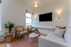 Televiisor ja/või meelelahutuskeskus majutusasutuses Seaside Haven in Donaghadee