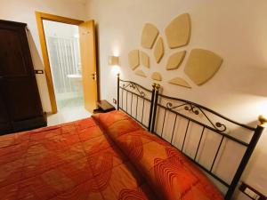 Postel nebo postele na pokoji v ubytování B&B Casa Cimino - Monopoli - Puglia