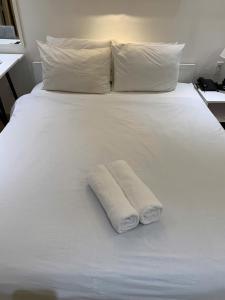 Postel nebo postele na pokoji v ubytování TwoLand Hotels & Spa