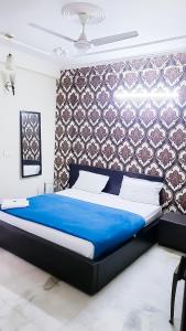 Postel nebo postele na pokoji v ubytování Deluxe Room In CR Park