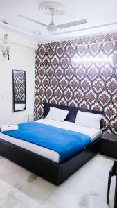 Postel nebo postele na pokoji v ubytování Deluxe Room In CR Park
