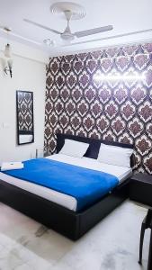 Postel nebo postele na pokoji v ubytování Deluxe Room In CR Park