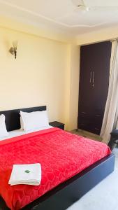 Postel nebo postele na pokoji v ubytování Deluxe Room In CR Park