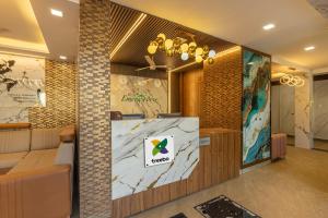 Kuchyň nebo kuchyňský kout v ubytování Treebo Premium Emerald Dove