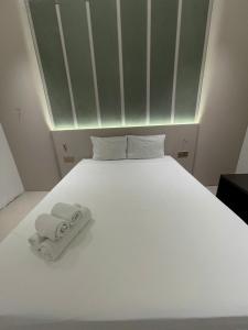 Postel nebo postele na pokoji v ubytování Con Meo Hostel