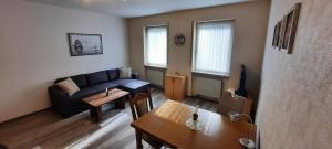 Posezení v ubytování Ferienwohnung Viktoria + 20 fotografií