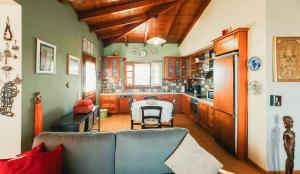 A kitchen or kitchenette at Villa Oneirama