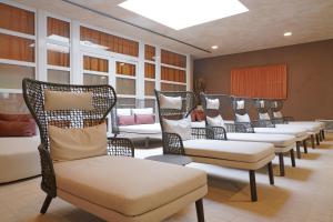 a row of chairs in a waiting room at Hotel Caesius Thermae & Spa Resort in Bardolino