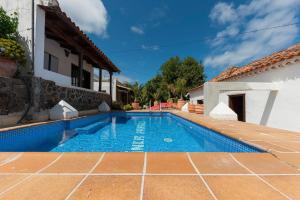 Bazén v ubytování Welcoming house with pool in San Cristóbal - 85 m² nebo v jeho okolí